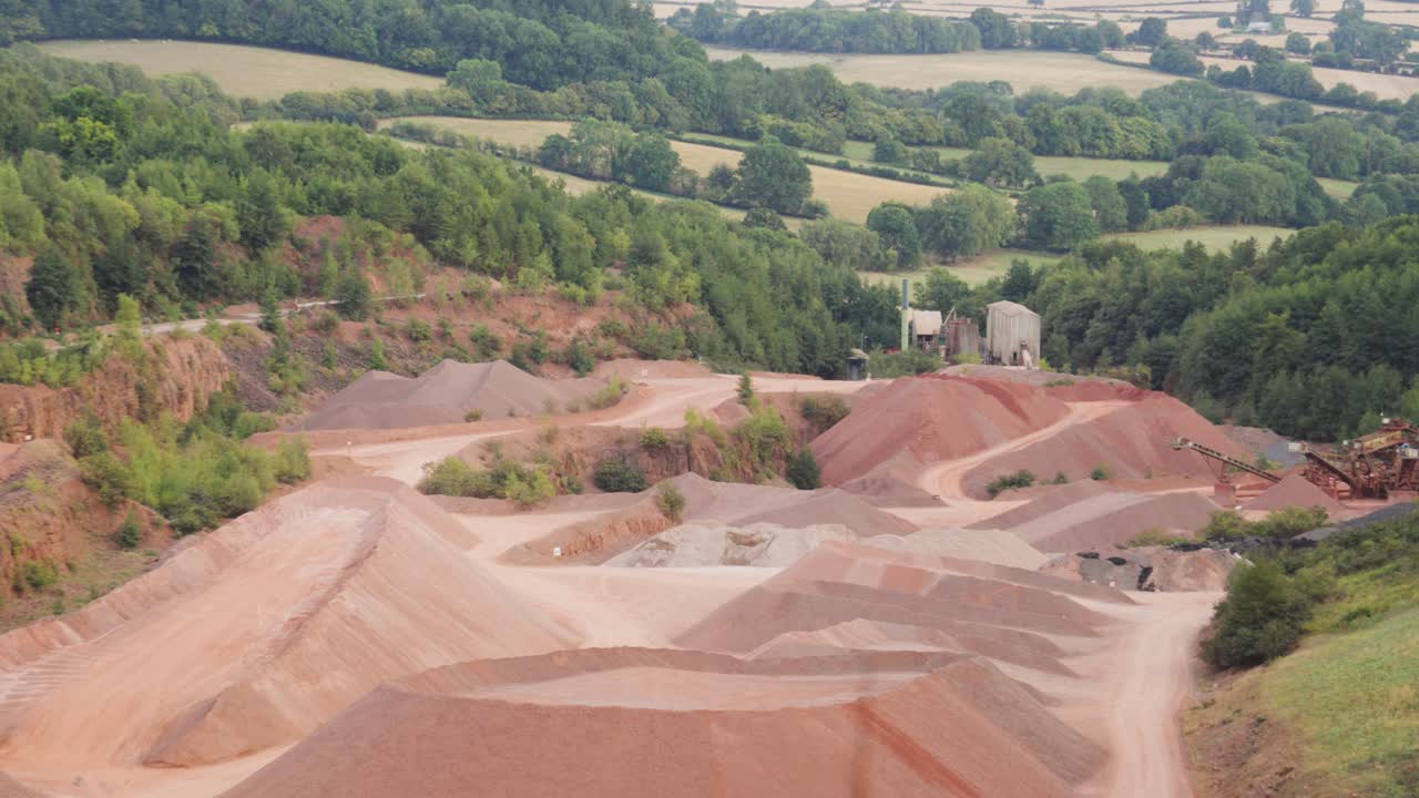 Quarry Surrounded by Forest Natural Landscape Used in Excavating Natural Resources Like Sand Stone Gravel. Heavy Mining Excavating Industry Surrounded by Environment
