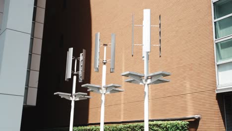 small wind turbines on a modern building