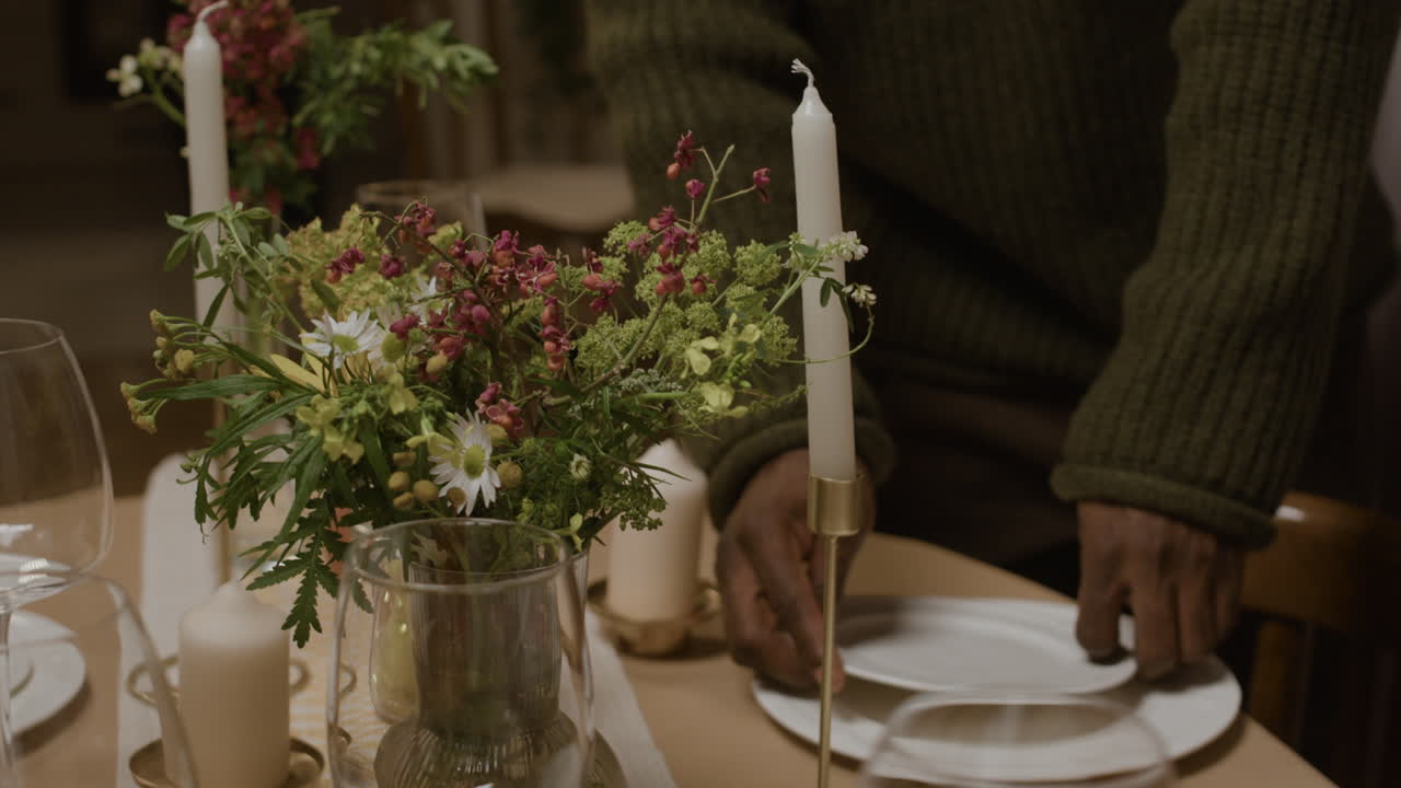 Festive Table Setting with Candles and Flowers