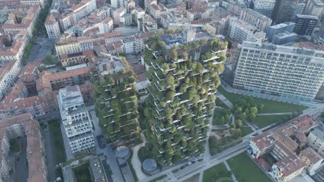 stunning drone footage of bosco verticale's green towers.