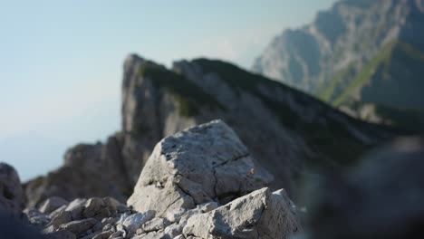 a drone takes flight from a rocky mountain formation amidst a breathtaking scenic backdrop, highlighting adventure, exploration, and technology in nature