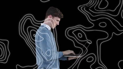 Animation-of-shapes-moving-over-caucasian-businessman-using-laptop