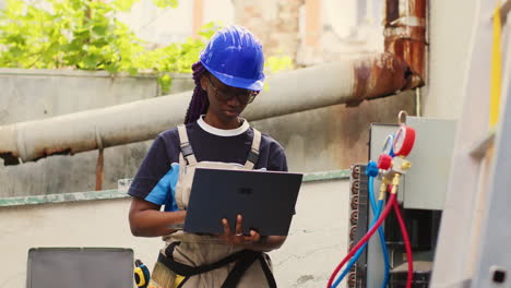 repairman servicing hvac system