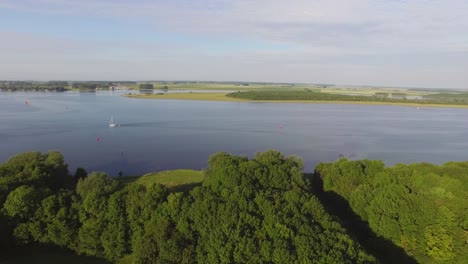 Aerial:-The-surroundings-and-the-historical-touristic-town-of-Veere,-the-Netherlands