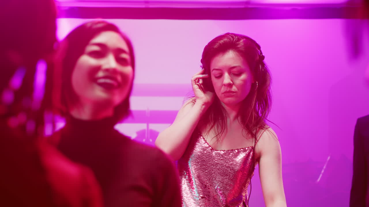 Nightclub scene with DJ, mannequin, and partygoers