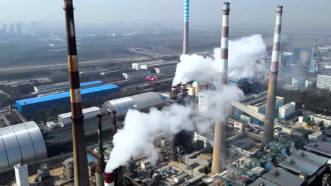 close-up view smoked pipes of chemical enterprise plant