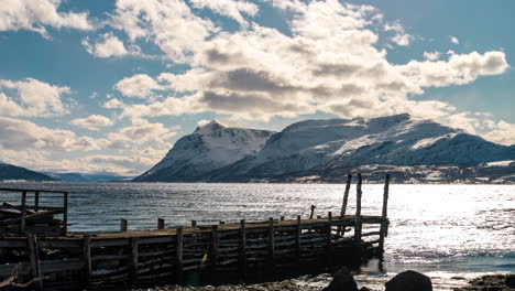 breathtaking view of the mountains and sea in spring at malangen fjord norway - timelapse shot