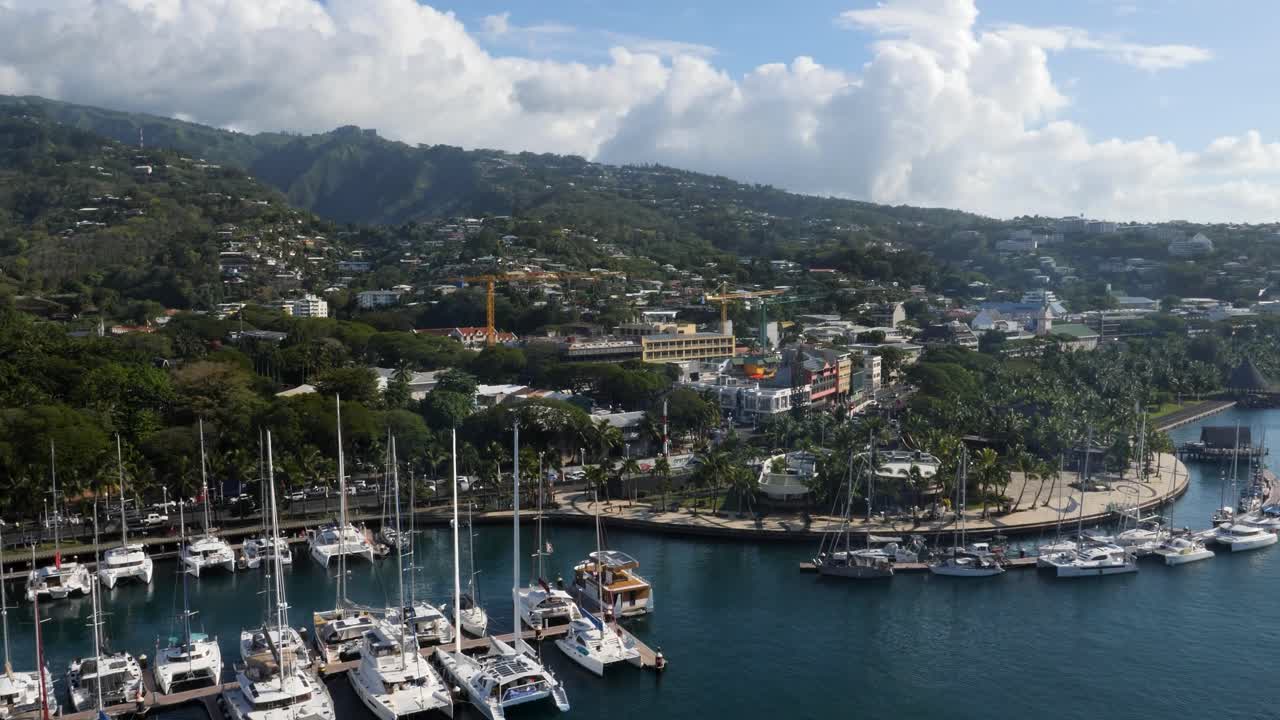 Nanuu Bay small boat marina in Papeete, Tahiti, French Polynesia. Papeete cityscape.