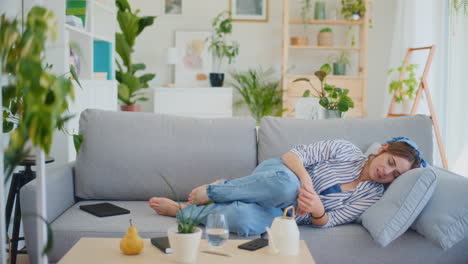 Alone-and-Troubled-Mentally-Distressed-Girl-on-Sofa