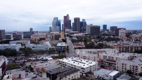 drone shot of downtown los angeles that pushes in and rises up