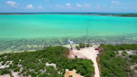 Drone-above-Sian-Kaʼan-Reserve-a-biosphere-Quintana-Roo-Mexico,-lonely-solitary-tropical-beach-paradise-aerial-view-of-ocean-Mexican-Caribbean-Sea