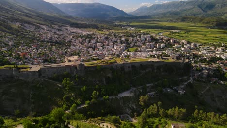 flying around gjirokaster fortress castle during sunset in albania