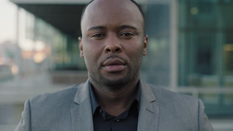 portrait of african american businessman proud business owner wearing suit