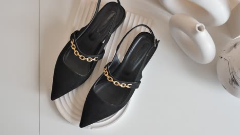 black suede slingback shoes with gold chain