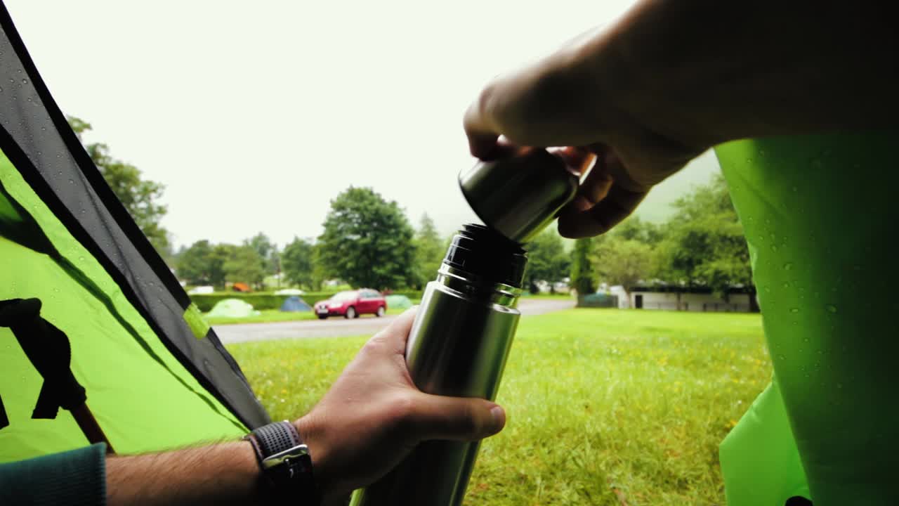 Drinking coffee out of the thermos in the tent. At the base of Ben Nevis - Sclotland