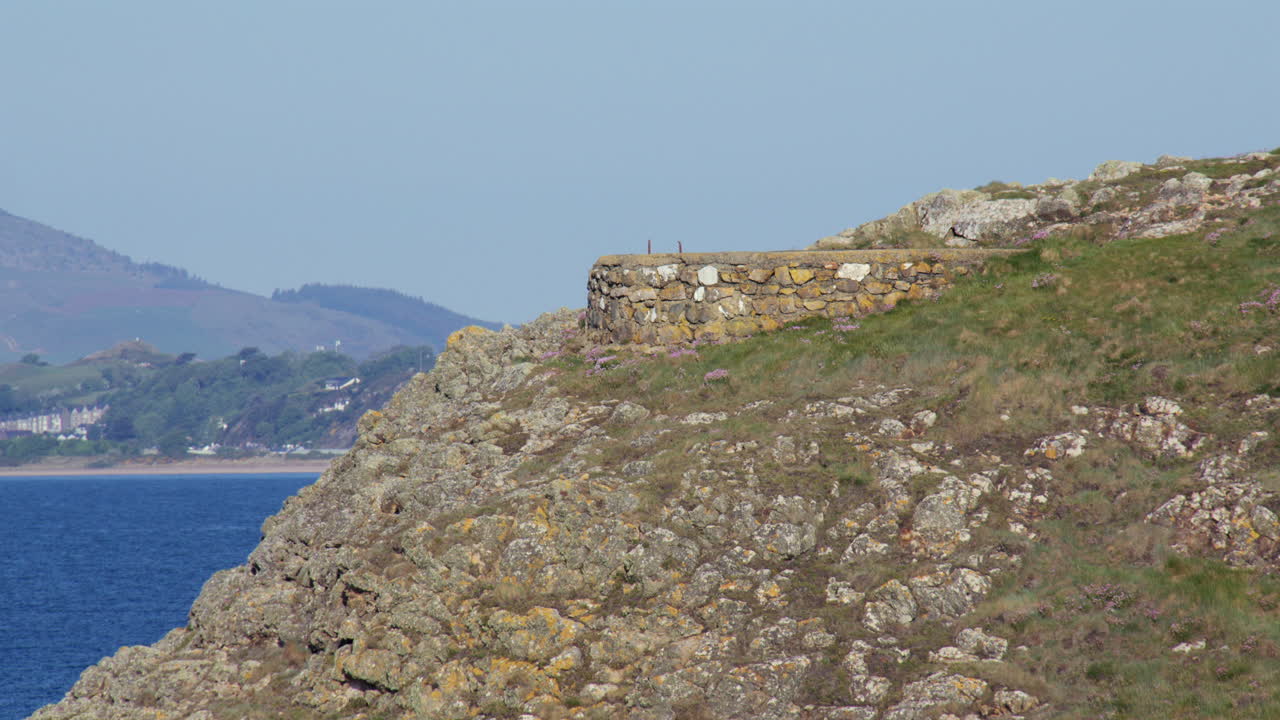 shot of Derelict military infrastructure at the headland at Hafan y Môr on Pen-y-chain, Pwllheli