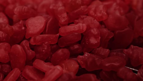 Close-up-shot-of-red-gelatin-based-gummy-vitamin-supplements