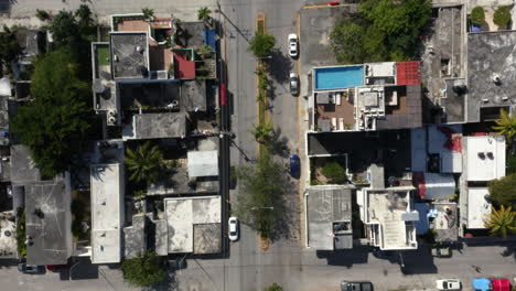 Bikers-cycling-on-street-in-residential-area-of-city-block-in-Mexico