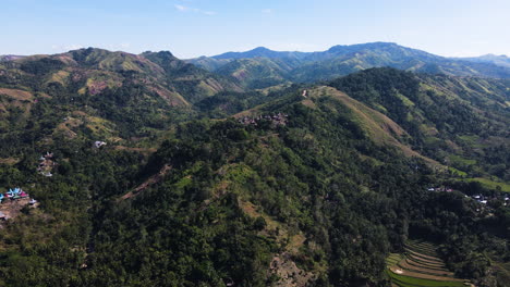 traditional sumbanese houses over mountain ridges in sumba island, east nusa tenggara, indonesia