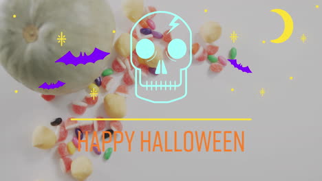 animation of happy halloween text over bats, pumpkin and sweets