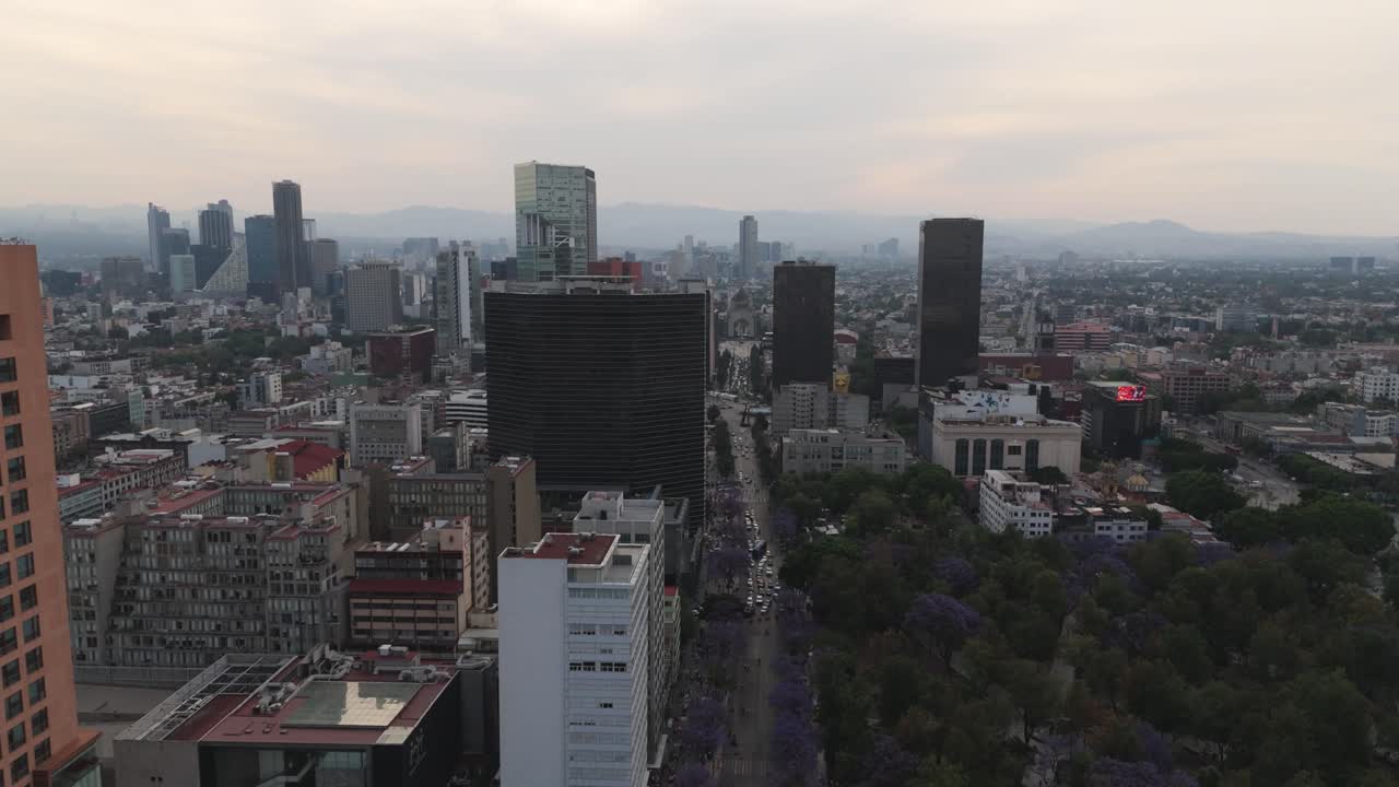 Historic center of Mexico City buildings at sunset