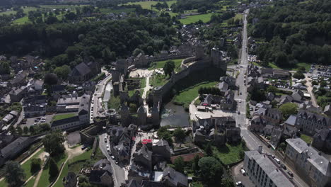 fougères castle, ille-et-vilaine in france. aerial drone descending