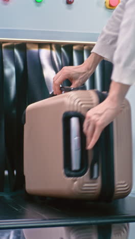 luggage at airport security scanner