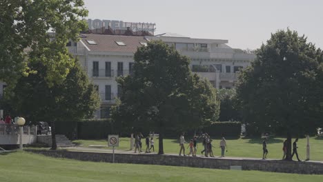 people are walking in a beautiful park