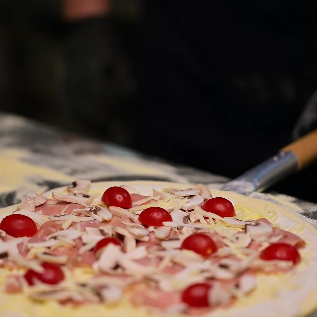 Chef is cooking pizza