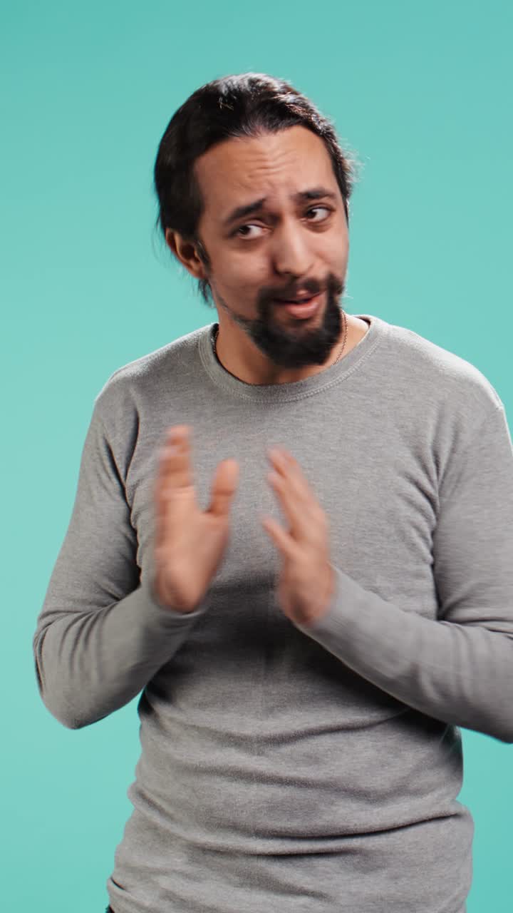 Vertical video Apologetic person doing sorry gesturing, asking for pardon