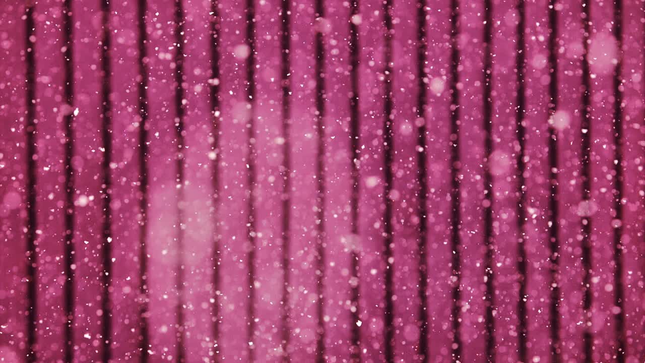Decorative pink background with layered snowflakes and gentle vertical flow