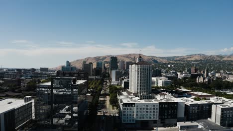 Wide-aerial-view-flying-through-Salt-Lake-City's-downtown-corporate-area