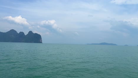 james bond island in the distance on the gulf of thailand