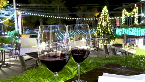 wine glasses in a festive outdoor setting