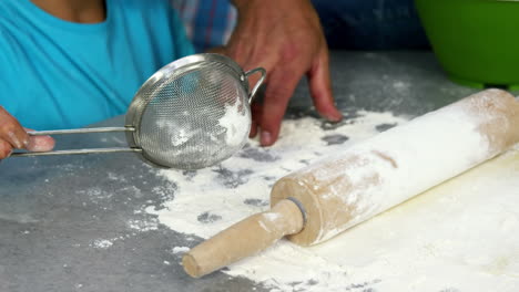 children preparing a cake