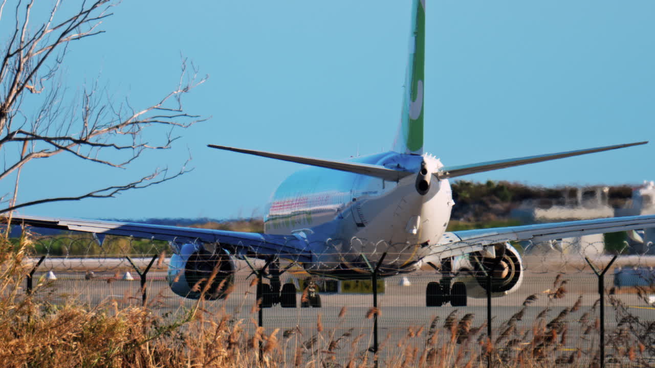 Nice, France - March 7, 2025: Airplane waiting at the airport in daylight