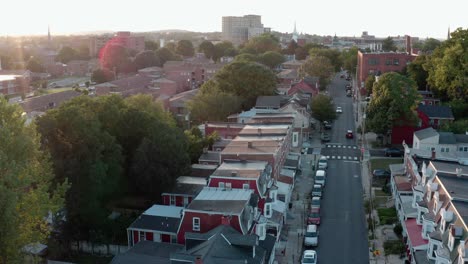 Reveal-of-urban-city-in-USA-at-summer-sunset