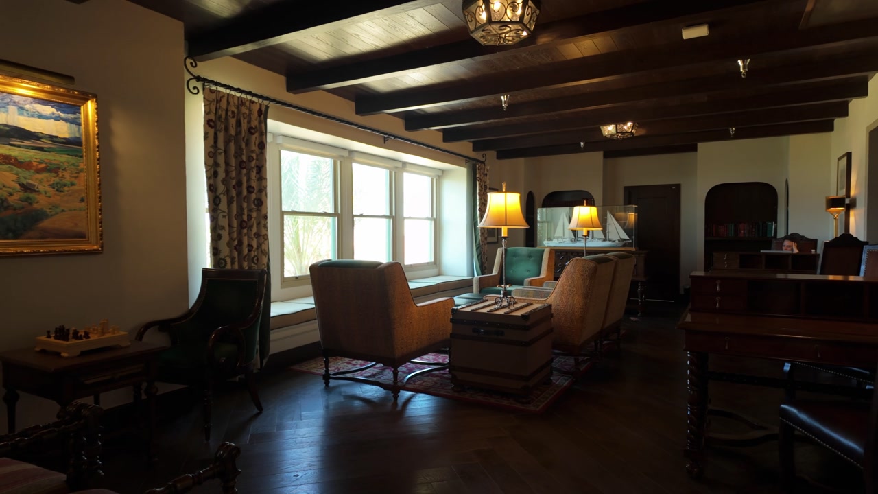 Gimbal wide panning shot of the historic lounge at The Inn at Death Valley, California. 4K