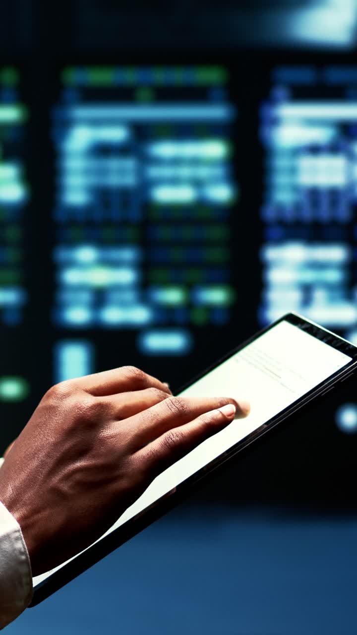Vertical video Technician inspecting server rigs