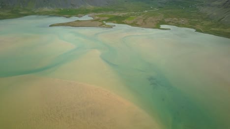 aerial view of icelandic coastline with tidal currents