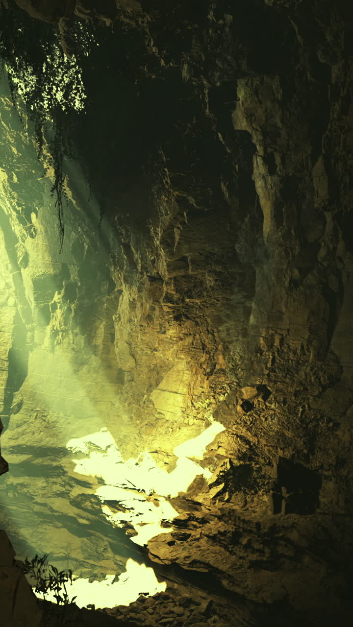 Sunlight filters through a canyon illuminating the rocky landscape