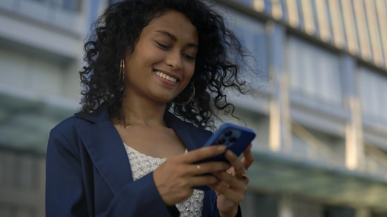 Woman using smartphone outside