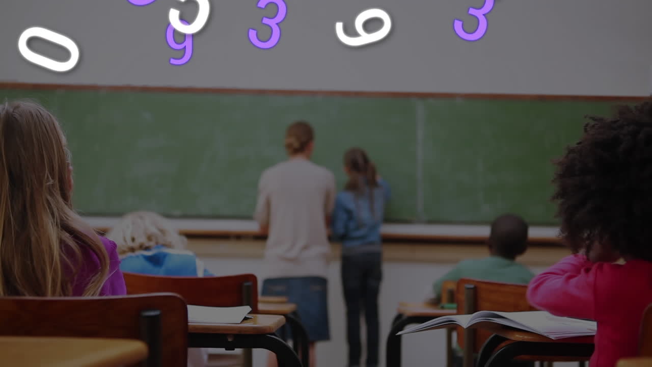 Multiple changing numbers floating against group of students studying at school