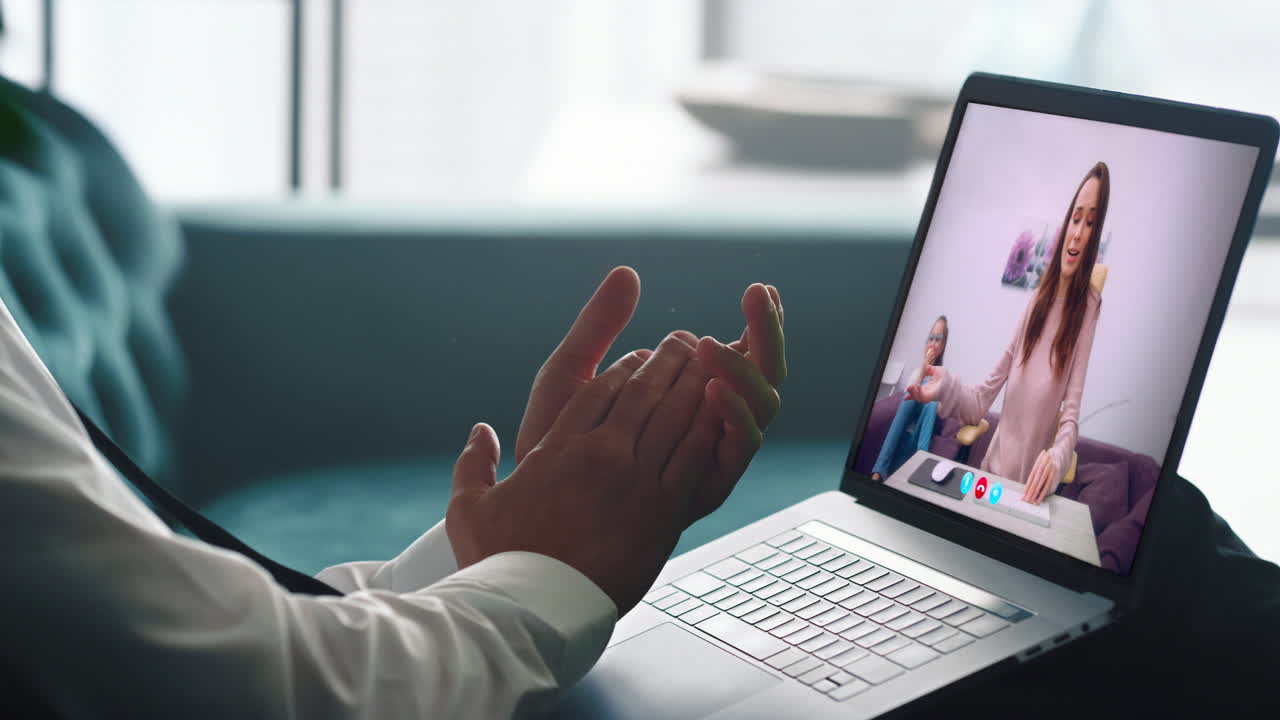 Remote worker calling colleague woman using laptop webcam chat closeup