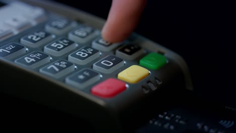 Use-credit-card.-Man-hand-with-credit-card-swipe-through-pos-terminal