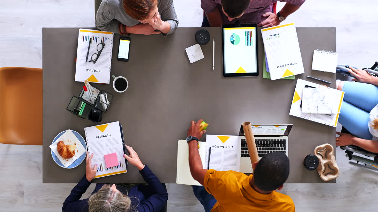 Top view, fast motion and team brainstorming