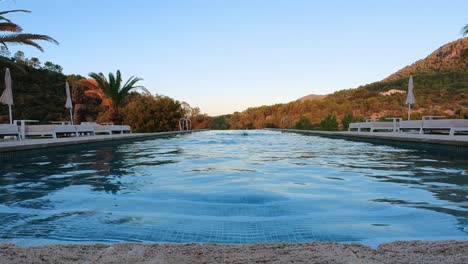 man getting out of an infinity pool