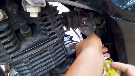 two wheeler motorbike maintenance at day from flat angle in details