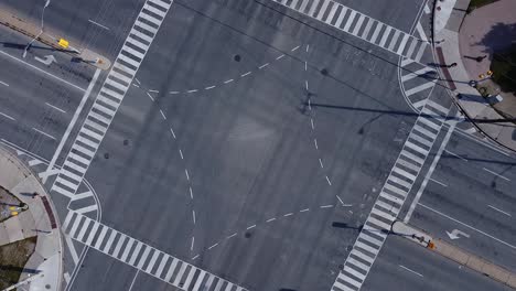 empty intersection in large urban city during covid-19 pandemic lockdown