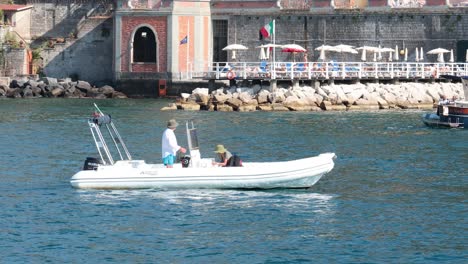 two people enjoying a boat ride